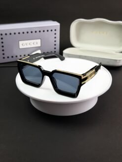 Gucci_gold_black_g2